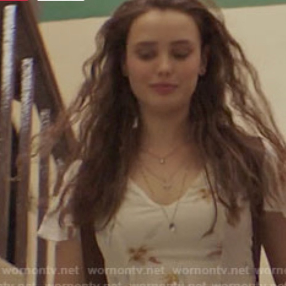 Hannah’s white floral v-neck sundress in a size 4 as seen on 13 reasons why.